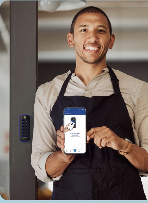 Business owner using the Centrios app with a Centrios smart lock on the door